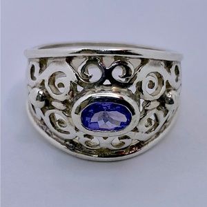 Beautiful sterling silver ( stamped 925) Iolite wide scroll style ring